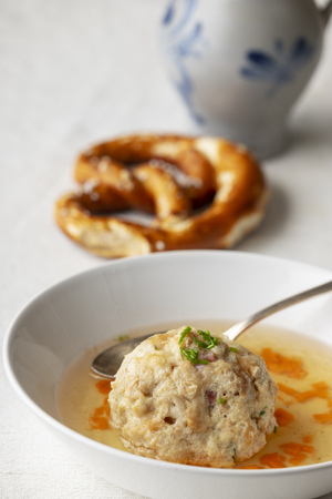 bavarian bacon dumpling in a brothの写真素材