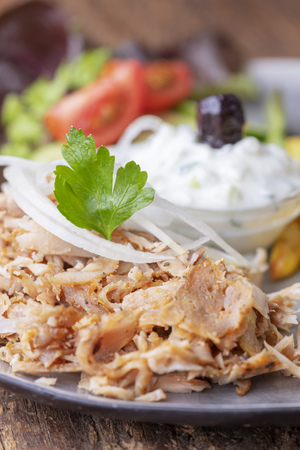 greek gyros with tzaziki and friesの写真素材