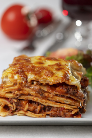 portion of lasagna on a plateの写真素材