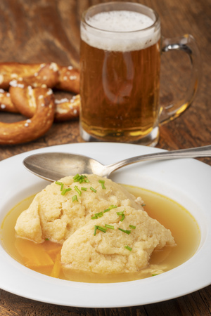 closeup of a bavarian semolina dumpling soupの写真素材