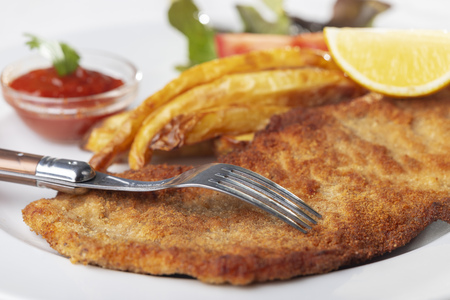wiener schnitzel on a plateの写真素材
