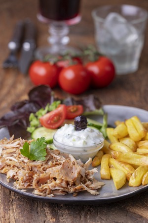 greek gyros with tzaziki and friesの写真素材