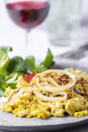 austrian spaetzle with salad and wineの写真素材