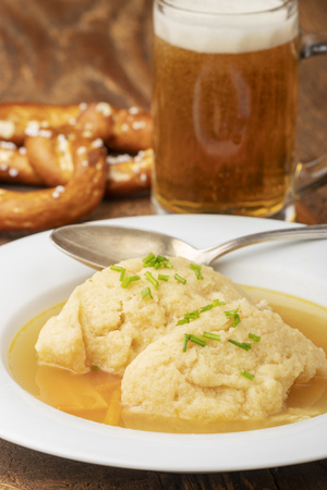 closeup of a bavarian semolina dumpling soupの写真素材