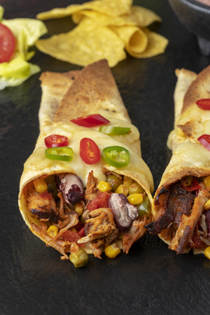 overview of enchiladas on slateの写真素材