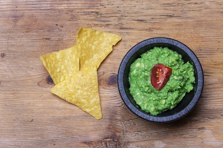 overview of guacamole on woodの写真素材