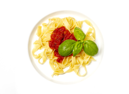 italian tagliatella pasta with tomato sauceの写真素材