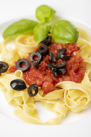 italian tagliatella pasta with tomato sauceの写真素材