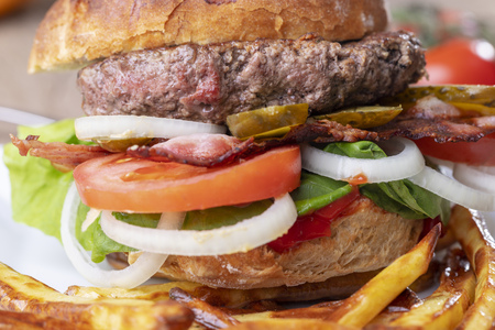 closeup of a hamburger with friesの写真素材