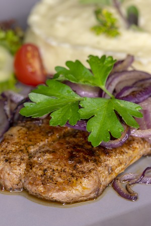 grilled pork steak with onionsの写真素材
