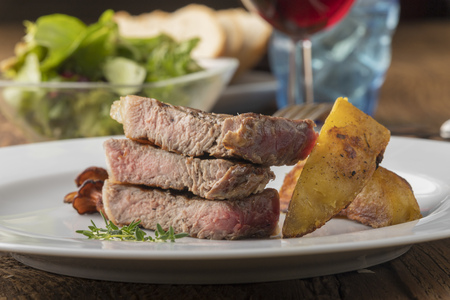 grilled steak with potatoの写真素材