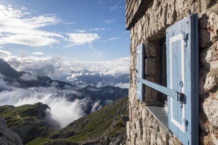 window of the meiler hut in the alpsの写真素材