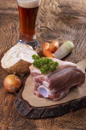 raw pork meat on woodの写真素材