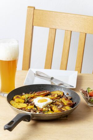 tyrolean potato groestl with onionsの写真素材