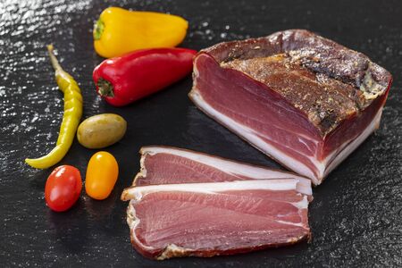 south tyrolean speck on slateの写真素材