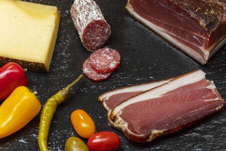 south tyrolean speck on slateの写真素材