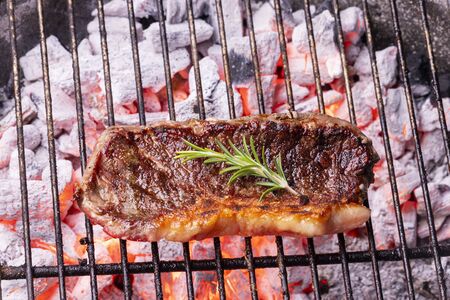 glowin charcoal with a beef steakの写真素材