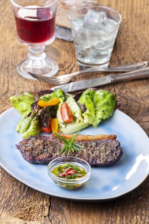 grilled steak a plate with saladの写真素材