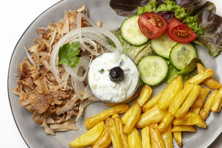 greek gyros with tzaziki and friesの写真素材