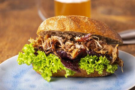 pulled pork in a bun with beerの写真素材