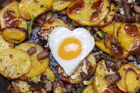 tyrolean potato groestl with onionsの写真素材