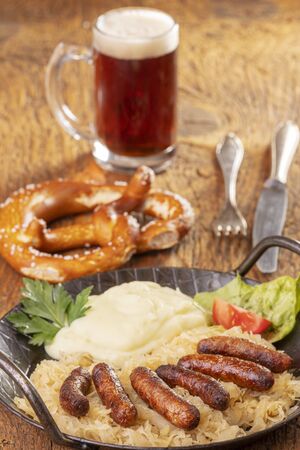 Nuremberg sausages with sauerkrautの写真素材