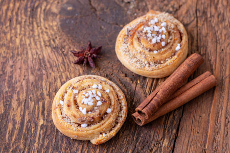 closeup of swedish kanelbullar with sugarの写真素材