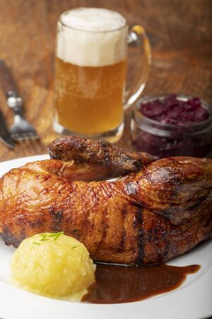grilled duck on a plate with dumplingの写真素材