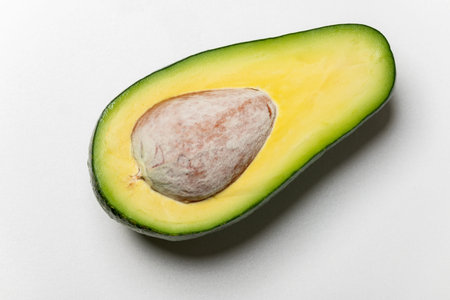 sliced avocado on white background 