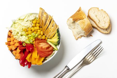 buddha bowl with chicken on woodの写真素材