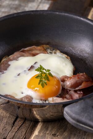 egg sunny side up in a panの写真素材
