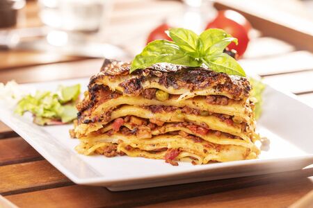 closeup of a portion of lasagna の写真素材