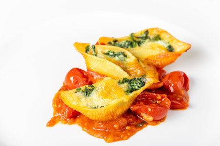 italian conchiglino pasta filled with spinachの写真素材