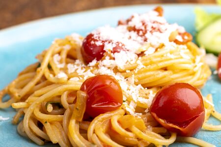 spaghetti pasta with cherry tomatoesの写真素材
