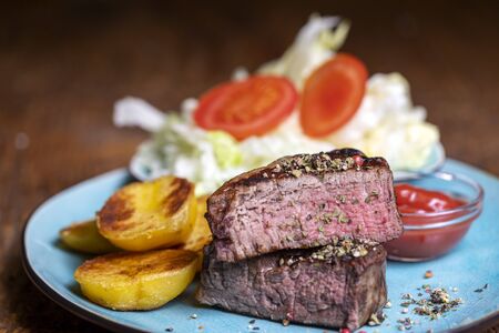 grilled steak on a plateの写真素材