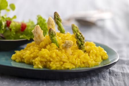 italian asparagus risotto with saladの写真素材