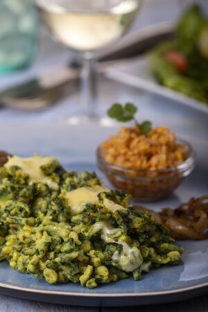 bavarian spinach spaetzle on a plateの写真素材