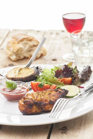 grilled chicken breast with saladの写真素材