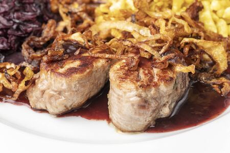 swabian pork fillets with spaetzle on a plateの写真素材