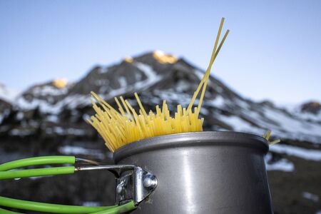 cooking pasta in the alpsの写真素材