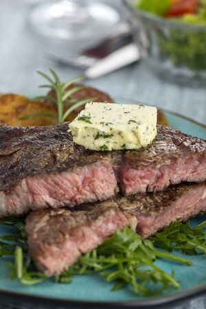 juicy grilled steak on a plateの写真素材