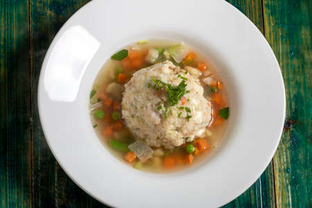 vegetable soup with a dumplingの写真素材