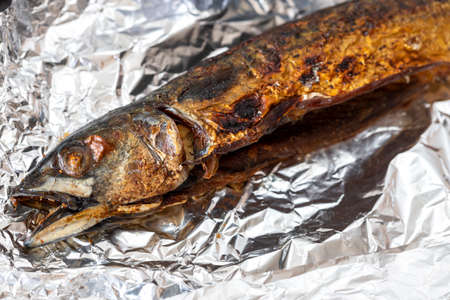 grilled makarel on alu foilの写真素材