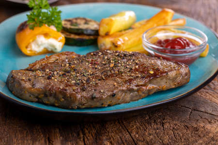 grilled steak with french friesの写真素材