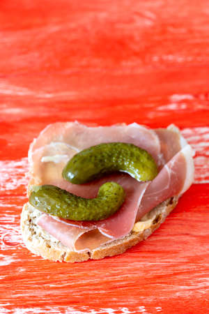 ham sandwich on red backgroundの写真素材