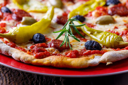fresh pizza with rosemaryの写真素材