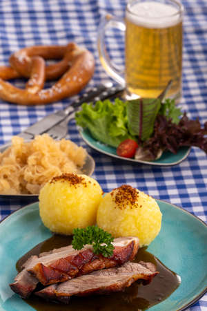 bavarian roasted pork with potato dumlingsの写真素材