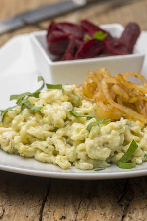 swabian pasta with wild garlic on a plateの写真素材
