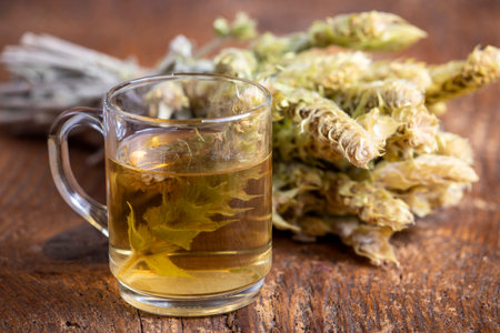 Greek sideritis tea on dark woodの写真素材