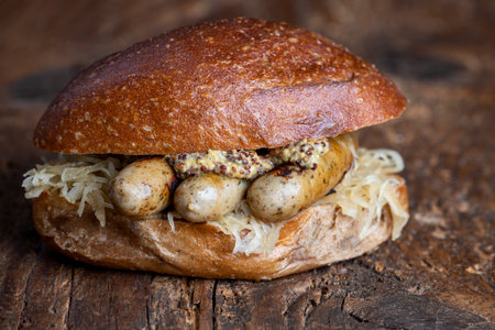 grilled nuremberg sausages in a bunの写真素材